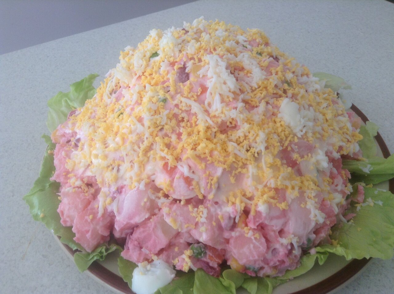 Real photograph of Cook Islands island mayonnaise with potato, beetroot, egg and salad vegetables